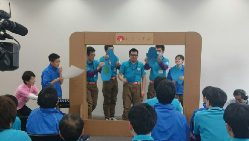 The merits of Dentsu Solari are illustrated by a classroom performance of skits.